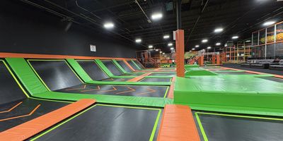Nova Adventure Park in Garner featuring a giant multi-level indoor playground with colorful slides and climbing structures.